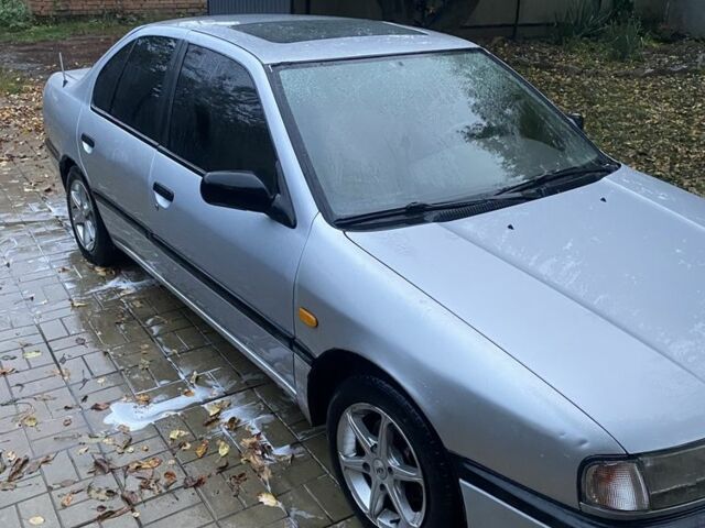 Серый Ниссан Примера, объемом двигателя 2 л и пробегом 300 тыс. км за 1450 $, фото 1 на Automoto.ua