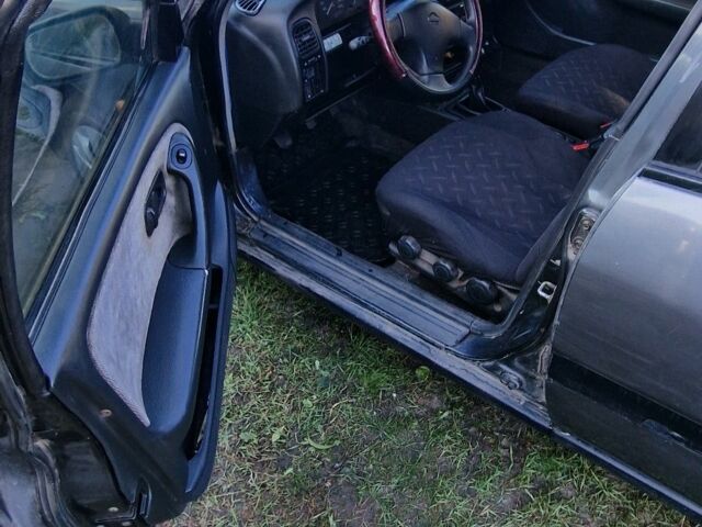 Серый Ниссан Примера, объемом двигателя 1.6 л и пробегом 300 тыс. км за 1500 $, фото 4 на Automoto.ua