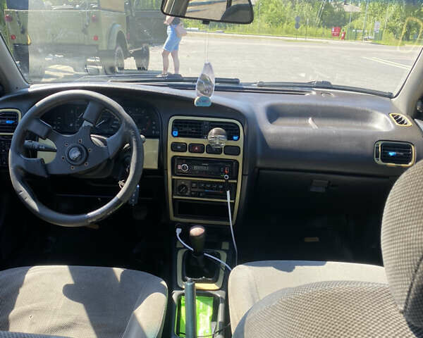 Сірий Ніссан Прімера, об'ємом двигуна 2 л та пробігом 354 тис. км за 1400 $, фото 7 на Automoto.ua