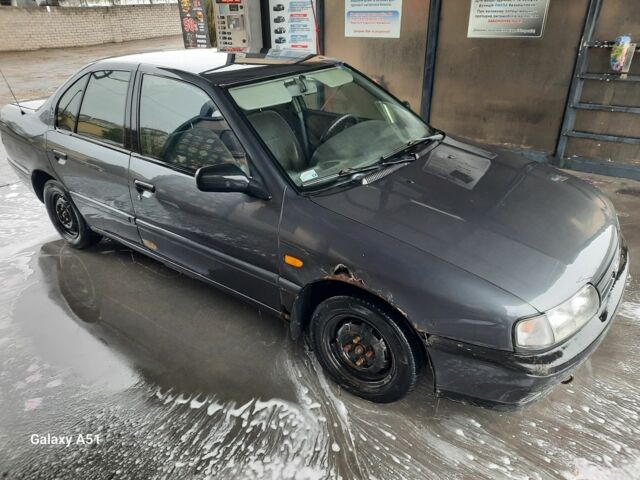 Серый Ниссан Примера, объемом двигателя 1.6 л и пробегом 280 тыс. км за 1000 $, фото 2 на Automoto.ua