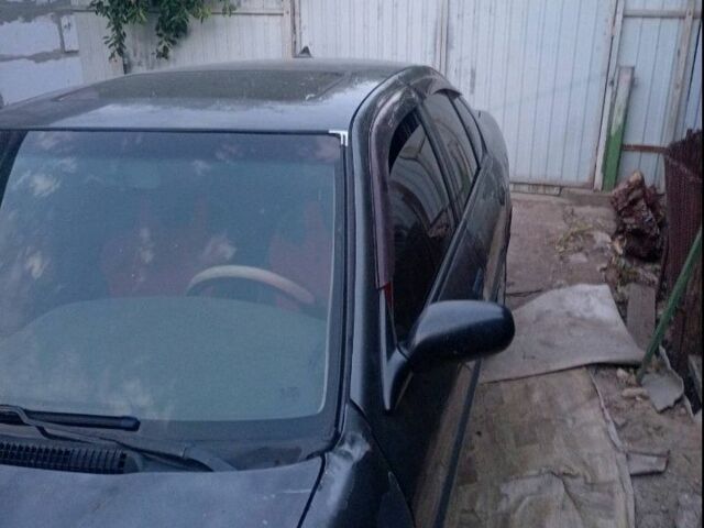 Серый Ниссан Примера, объемом двигателя 1 л и пробегом 300 тыс. км за 600 $, фото 6 на Automoto.ua