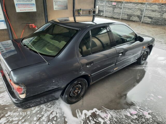 Серый Ниссан Примера, объемом двигателя 1.6 л и пробегом 280 тыс. км за 1000 $, фото 6 на Automoto.ua