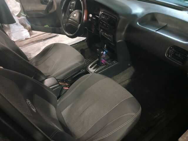 Сірий Ніссан Прімера, об'ємом двигуна 2 л та пробігом 250 тис. км за 1350 $, фото 4 на Automoto.ua