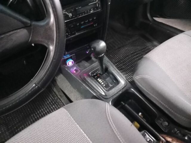 Сірий Ніссан Прімера, об'ємом двигуна 2 л та пробігом 250 тис. км за 1350 $, фото 2 на Automoto.ua