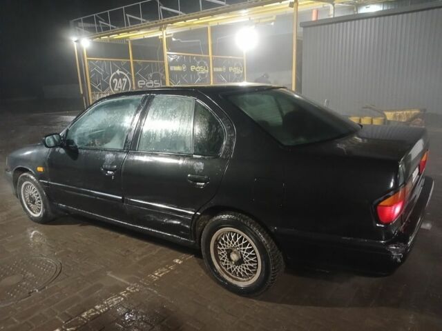 Сірий Ніссан Прімера, об'ємом двигуна 2 л та пробігом 250 тис. км за 1350 $, фото 6 на Automoto.ua