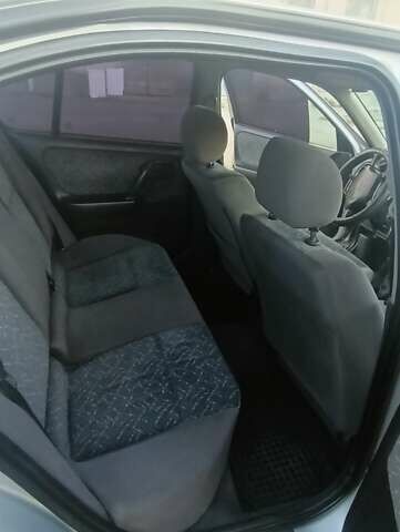 Серый Ниссан Примера, объемом двигателя 2 л и пробегом 350 тыс. км за 2300 $, фото 12 на Automoto.ua