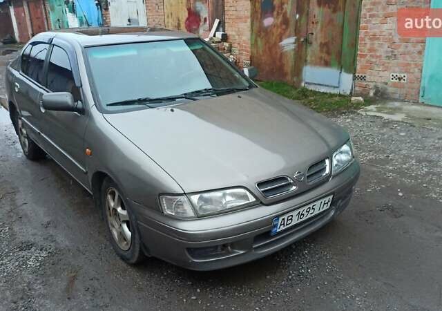 Серый Ниссан Примера, объемом двигателя 2 л и пробегом 332 тыс. км за 2150 $, фото 11 на Automoto.ua