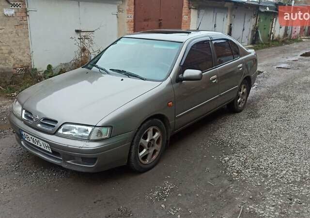 Серый Ниссан Примера, объемом двигателя 2 л и пробегом 332 тыс. км за 2150 $, фото 6 на Automoto.ua