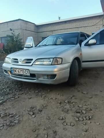 Серый Ниссан Примера, объемом двигателя 2 л и пробегом 350 тыс. км за 2300 $, фото 2 на Automoto.ua