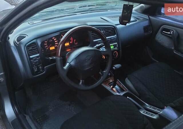 Серый Ниссан Примера, объемом двигателя 2 л и пробегом 332 тыс. км за 2150 $, фото 19 на Automoto.ua