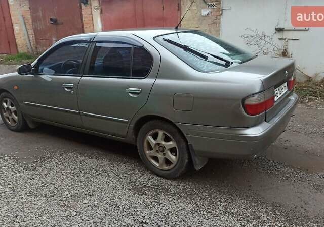 Серый Ниссан Примера, объемом двигателя 2 л и пробегом 332 тыс. км за 2150 $, фото 19 на Automoto.ua