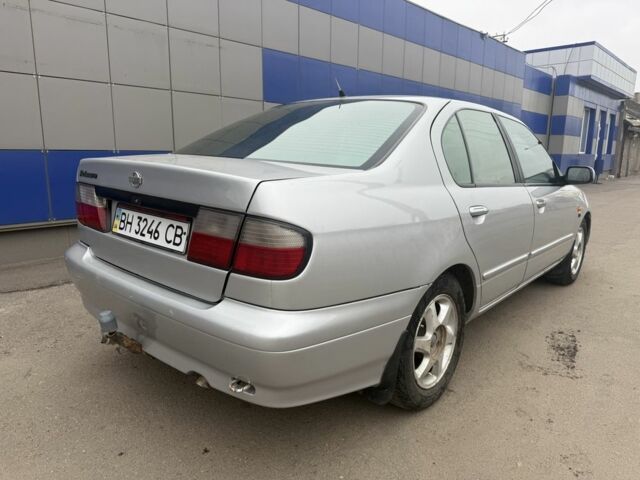 Серый Ниссан Примера, объемом двигателя 2 л и пробегом 336 тыс. км за 2800 $, фото 2 на Automoto.ua