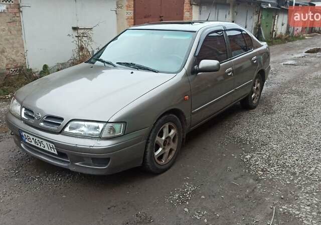 Серый Ниссан Примера, объемом двигателя 2 л и пробегом 332 тыс. км за 2150 $, фото 7 на Automoto.ua