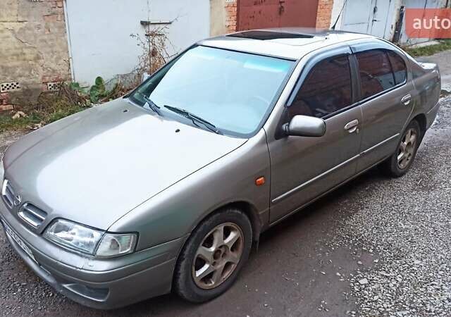 Серый Ниссан Примера, объемом двигателя 2 л и пробегом 332 тыс. км за 2150 $, фото 21 на Automoto.ua