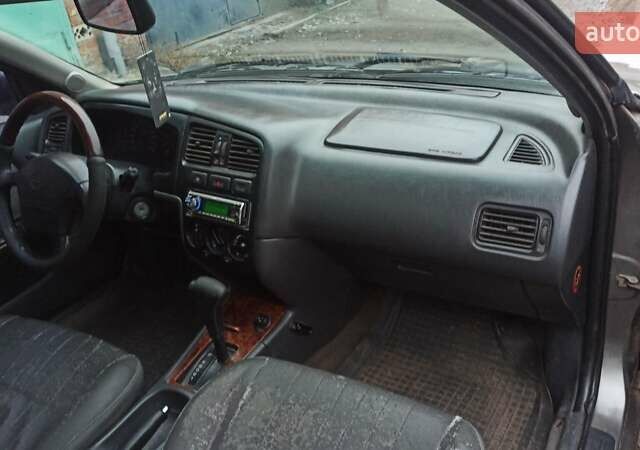 Серый Ниссан Примера, объемом двигателя 2 л и пробегом 332 тыс. км за 2150 $, фото 26 на Automoto.ua