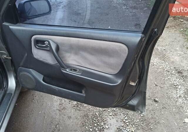 Серый Ниссан Примера, объемом двигателя 2 л и пробегом 332 тыс. км за 2150 $, фото 27 на Automoto.ua