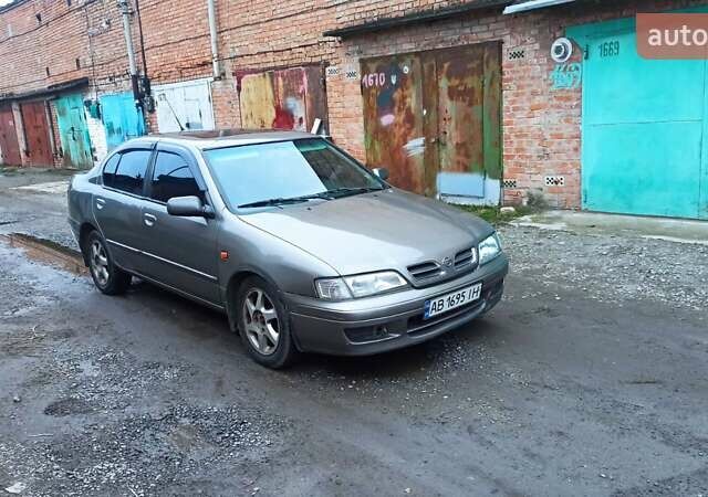 Серый Ниссан Примера, объемом двигателя 2 л и пробегом 332 тыс. км за 2150 $, фото 4 на Automoto.ua