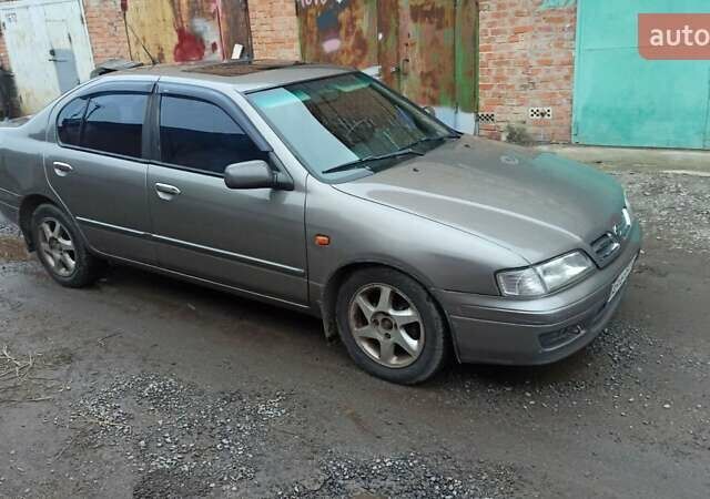Серый Ниссан Примера, объемом двигателя 2 л и пробегом 332 тыс. км за 2150 $, фото 12 на Automoto.ua