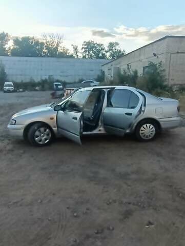 Серый Ниссан Примера, объемом двигателя 2 л и пробегом 350 тыс. км за 2300 $, фото 1 на Automoto.ua