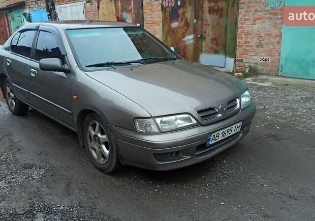 Серый Ниссан Примера, объемом двигателя 2 л и пробегом 332 тыс. км за 2150 $, фото 10 на Automoto.ua