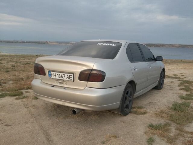 Сірий Ніссан Прімера, об'ємом двигуна 2 л та пробігом 200 тис. км за 2600 $, фото 6 на Automoto.ua