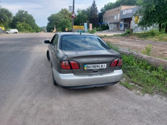 Серый Ниссан Примера, объемом двигателя 1.6 л и пробегом 400 тыс. км за 2000 $, фото 7 на Automoto.ua