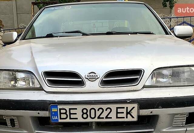 Сірий Ніссан Прімера, об'ємом двигуна 2 л та пробігом 300 тис. км за 2000 $, фото 3 на Automoto.ua