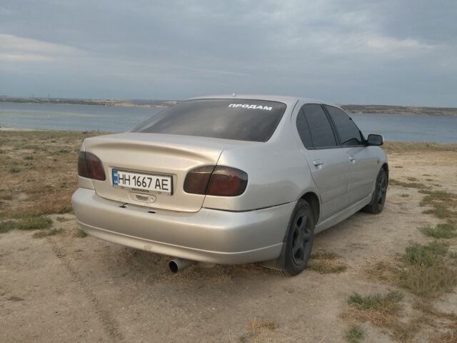 Сірий Ніссан Прімера, об'ємом двигуна 2 л та пробігом 200 тис. км за 2600 $, фото 3 на Automoto.ua