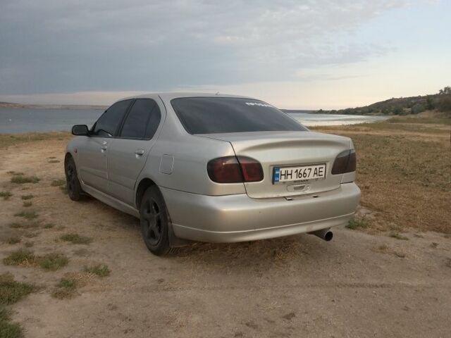 Сірий Ніссан Прімера, об'ємом двигуна 2 л та пробігом 200 тис. км за 2600 $, фото 7 на Automoto.ua