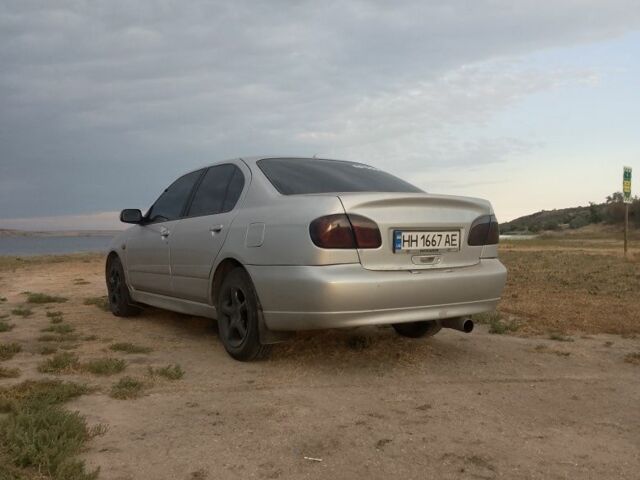 Сірий Ніссан Прімера, об'ємом двигуна 2 л та пробігом 200 тис. км за 2600 $, фото 1 на Automoto.ua