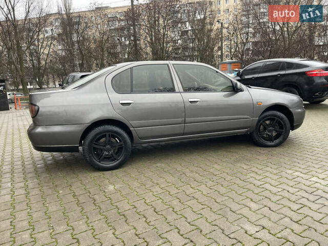 Серый Ниссан Примера, объемом двигателя 2 л и пробегом 500 тыс. км за 2499 $, фото 6 на Automoto.ua