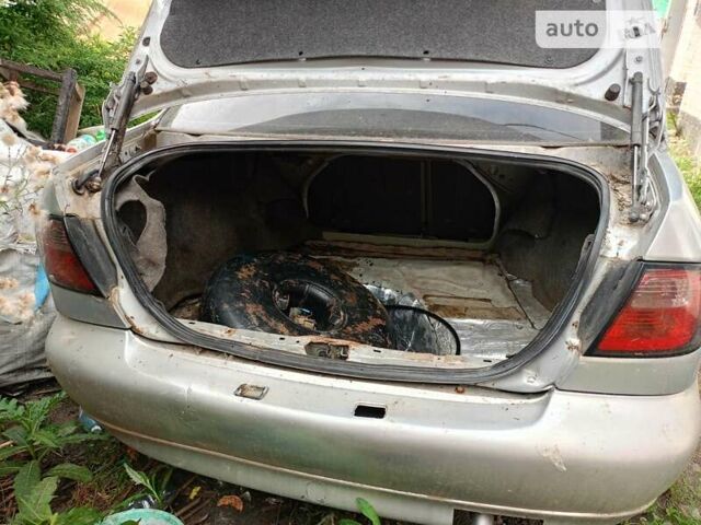 Серый Ниссан Примера, объемом двигателя 2 л и пробегом 319 тыс. км за 1200 $, фото 5 на Automoto.ua