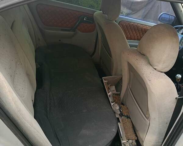 Серый Ниссан Примера, объемом двигателя 2 л и пробегом 319 тыс. км за 1200 $, фото 3 на Automoto.ua