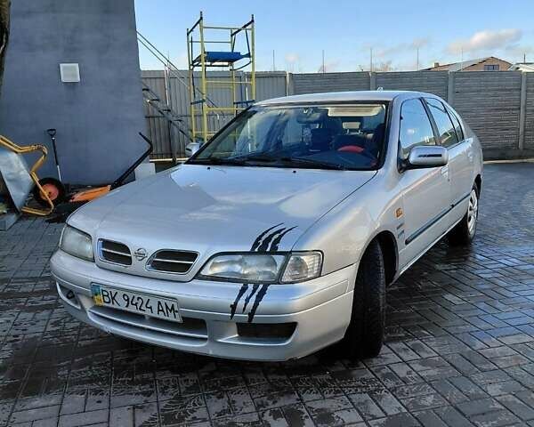 Сірий Ніссан Прімера, об'ємом двигуна 2 л та пробігом 354 тис. км за 2300 $, фото 5 на Automoto.ua