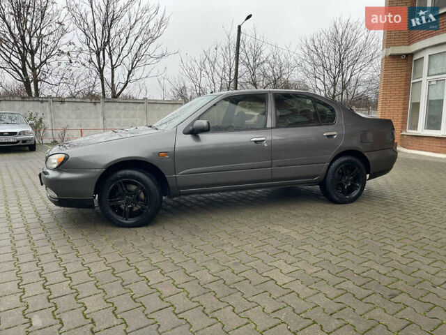 Серый Ниссан Примера, объемом двигателя 2 л и пробегом 500 тыс. км за 2499 $, фото 2 на Automoto.ua