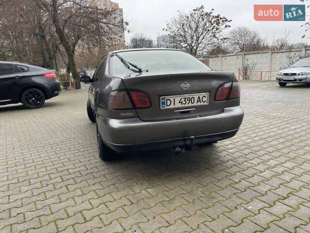 Серый Ниссан Примера, объемом двигателя 2 л и пробегом 500 тыс. км за 2499 $, фото 4 на Automoto.ua
