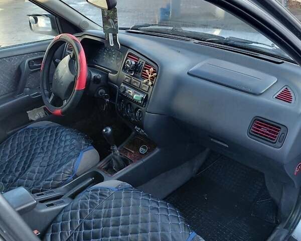 Сірий Ніссан Прімера, об'ємом двигуна 2 л та пробігом 354 тис. км за 2300 $, фото 1 на Automoto.ua