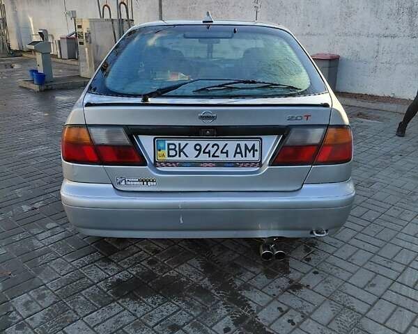 Сірий Ніссан Прімера, об'ємом двигуна 2 л та пробігом 354 тис. км за 2300 $, фото 4 на Automoto.ua