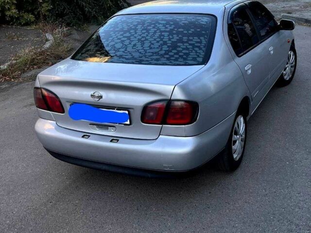 Сірий Ніссан Прімера, об'ємом двигуна 1.6 л та пробігом 267 тис. км за 3500 $, фото 3 на Automoto.ua