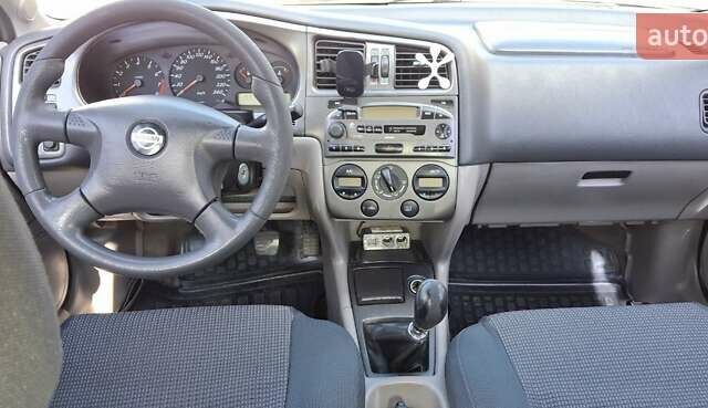 Серый Ниссан Примера, объемом двигателя 1.6 л и пробегом 185 тыс. км за 2599 $, фото 9 на Automoto.ua