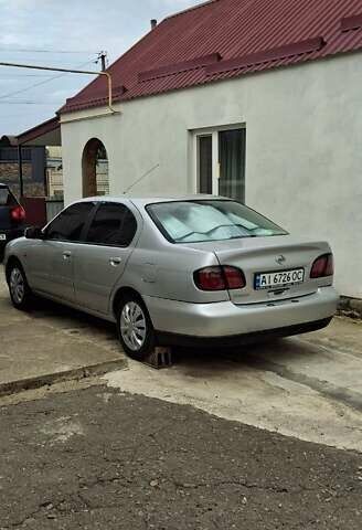 Серый Ниссан Примера, объемом двигателя 1.6 л и пробегом 185 тыс. км за 2599 $, фото 3 на Automoto.ua