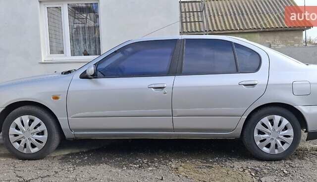 Серый Ниссан Примера, объемом двигателя 1.6 л и пробегом 185 тыс. км за 2599 $, фото 12 на Automoto.ua