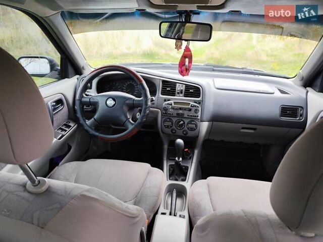 Серый Ниссан Примера, объемом двигателя 1.77 л и пробегом 330 тыс. км за 2800 $, фото 8 на Automoto.ua