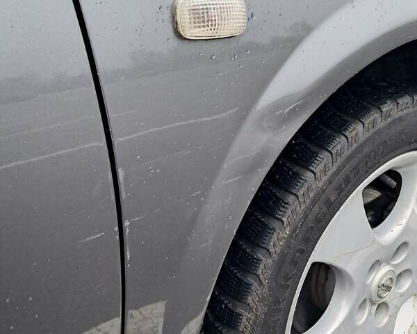 Серый Ниссан Примера, объемом двигателя 1.8 л и пробегом 232 тыс. км за 3500 $, фото 10 на Automoto.ua