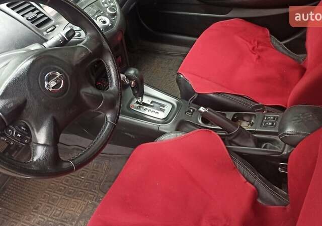 Сірий Ніссан Прімера, об'ємом двигуна 2 л та пробігом 215 тис. км за 3800 $, фото 4 на Automoto.ua