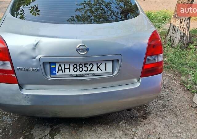 Серый Ниссан Примера, объемом двигателя 2 л и пробегом 310 тыс. км за 3600 $, фото 3 на Automoto.ua