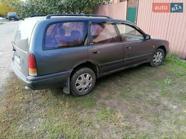 Сірий Ніссан Прімера, об'ємом двигуна 2 л та пробігом 333 тис. км за 1300 $, фото 3 на Automoto.ua