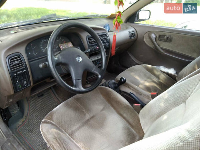 Серый Ниссан Примера, объемом двигателя 2 л и пробегом 145 тыс. км за 2800 $, фото 1 на Automoto.ua