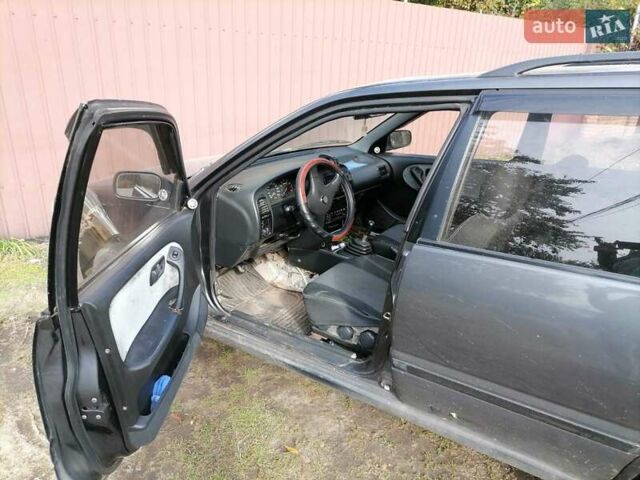 Сірий Ніссан Прімера, об'ємом двигуна 2 л та пробігом 333 тис. км за 1300 $, фото 4 на Automoto.ua