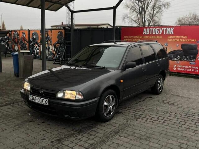 Серый Ниссан Примера, объемом двигателя 2 л и пробегом 1 тыс. км за 1500 $, фото 1 на Automoto.ua